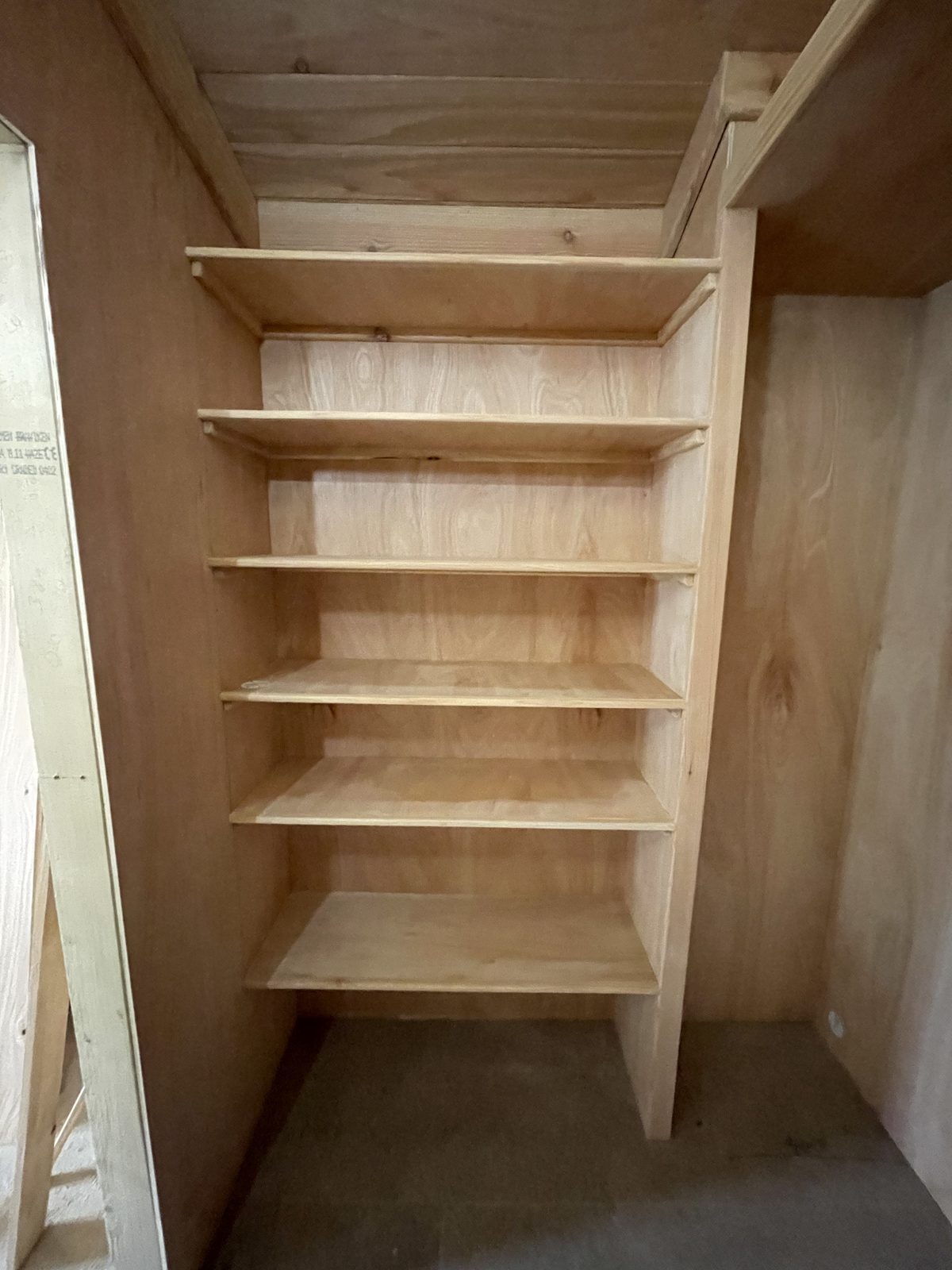 Fitted floor-to-ceiling pantry shelving