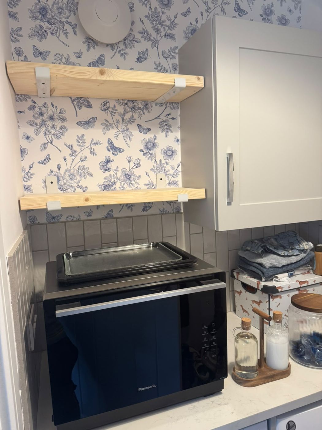 Bespoke timber shelves made and fitted in a kitchen alcove